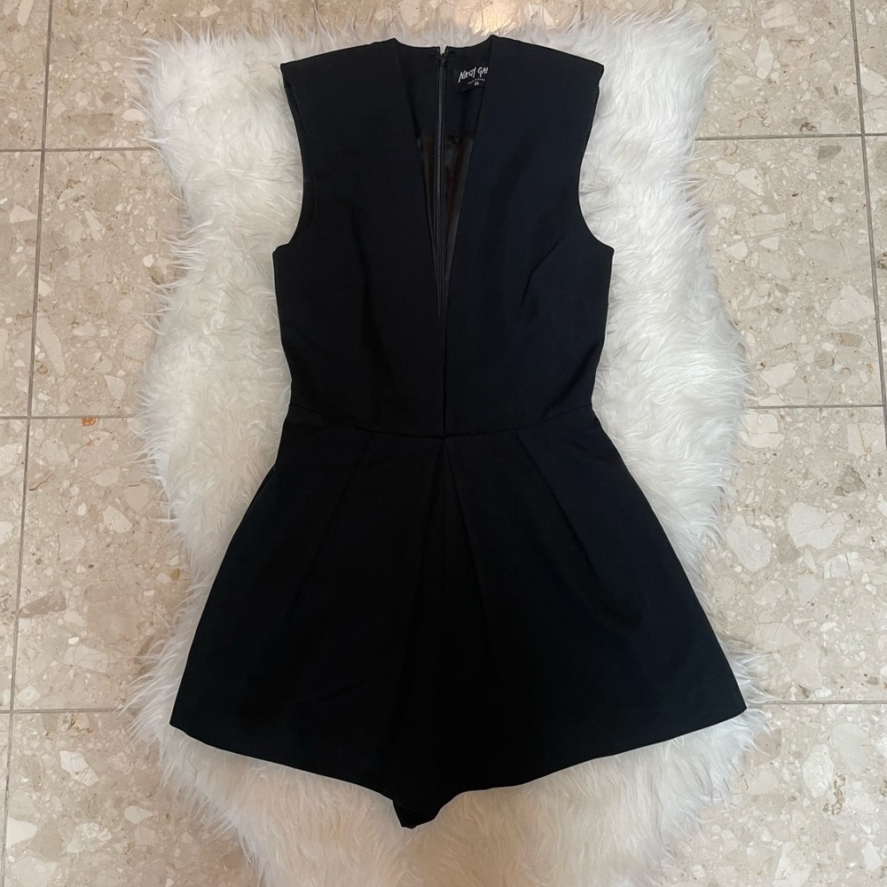 Nasty gal plunge cut black romper with shoulder padding size XS